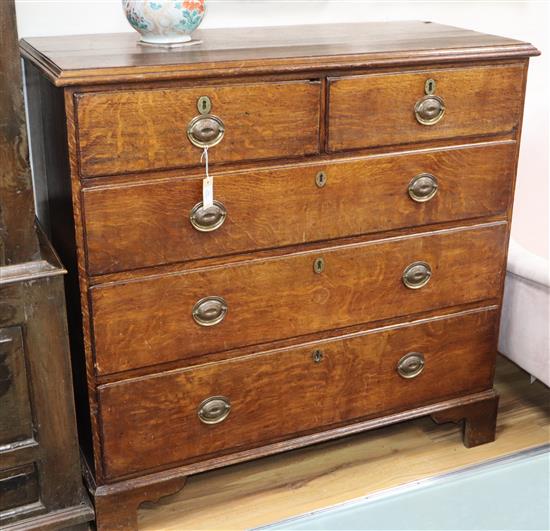 A George III oak chest of drawers W.118cm